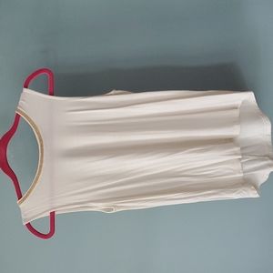 Banana Republic size small tank top with beaded neckline.